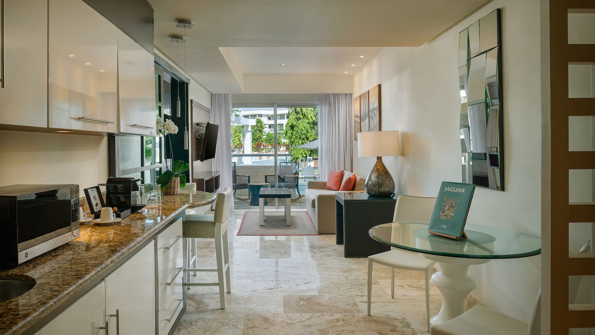 a kitchen and dining area in a hotel