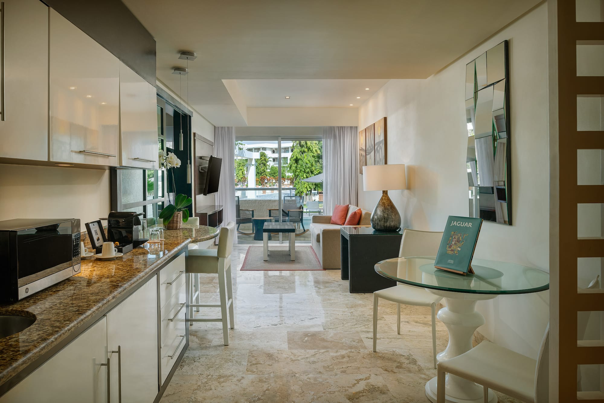 a kitchen and dining area in a hotel