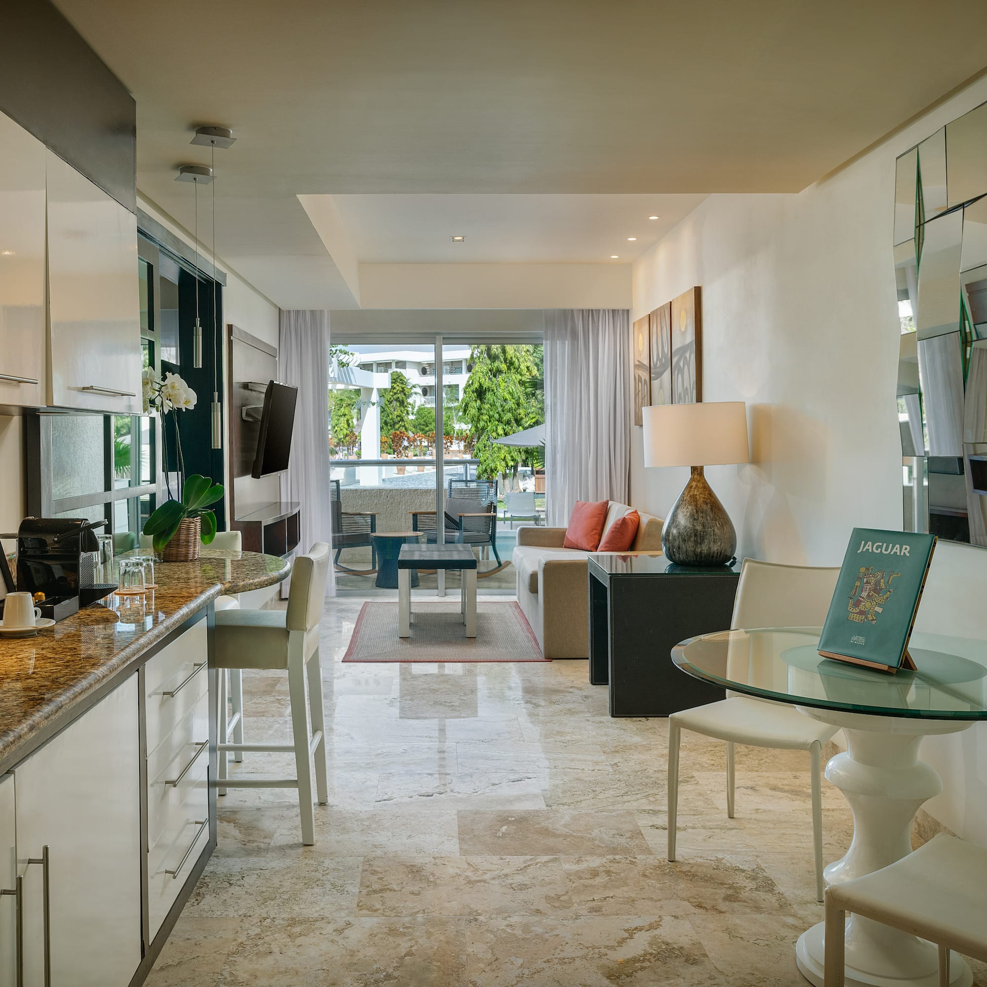 a kitchen and dining area in a hotel