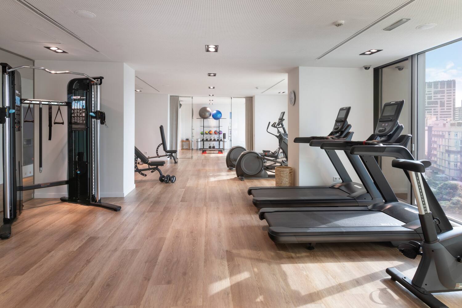 a room with exercise equipment and exercise machines