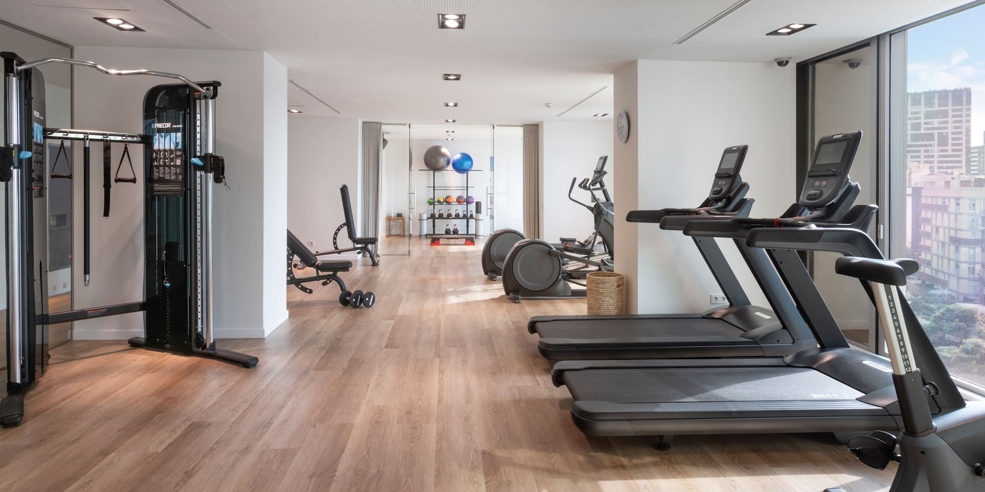 a room with exercise equipment and exercise machines