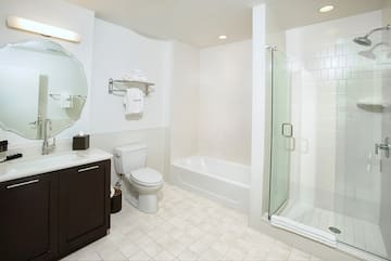a bathroom with a shower and toilet