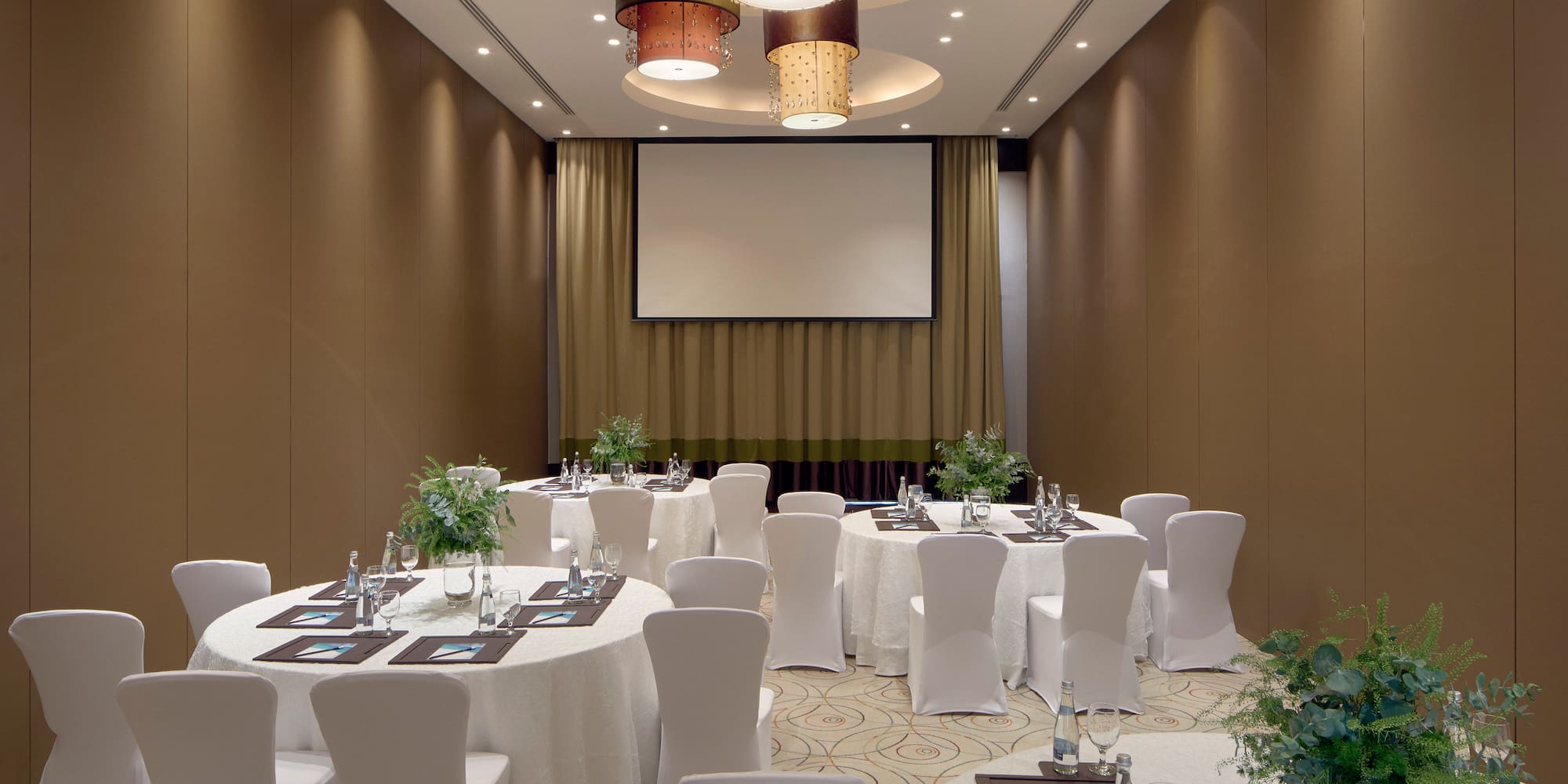 a room with tables and chairs