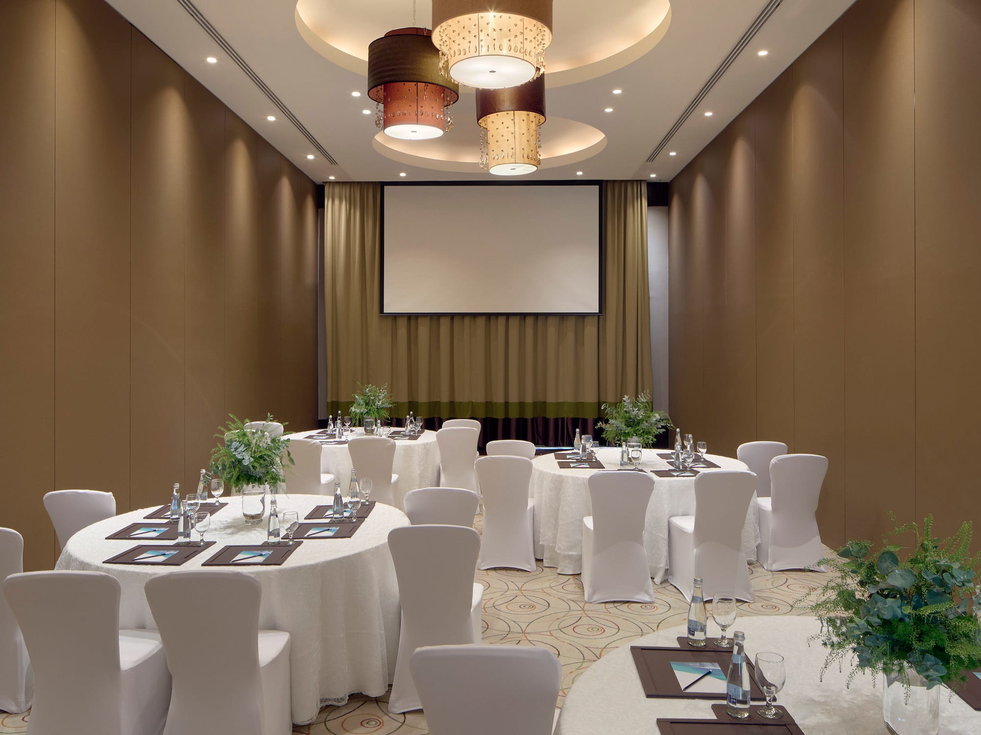 a room with tables and chairs