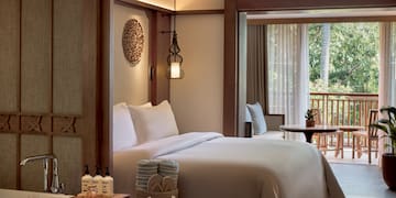 a room with a bed and a table