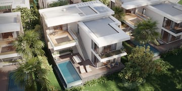 a house with a pool in the middle of it