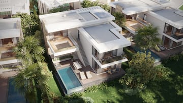 a house with a pool in the middle of it