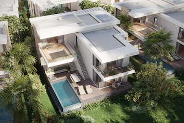 a house with a pool in the middle of it