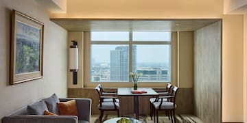 a room with a table and chairs