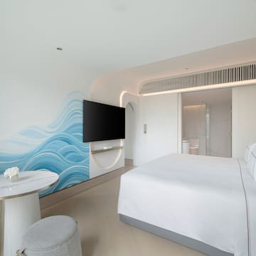 a room with a bed and a table