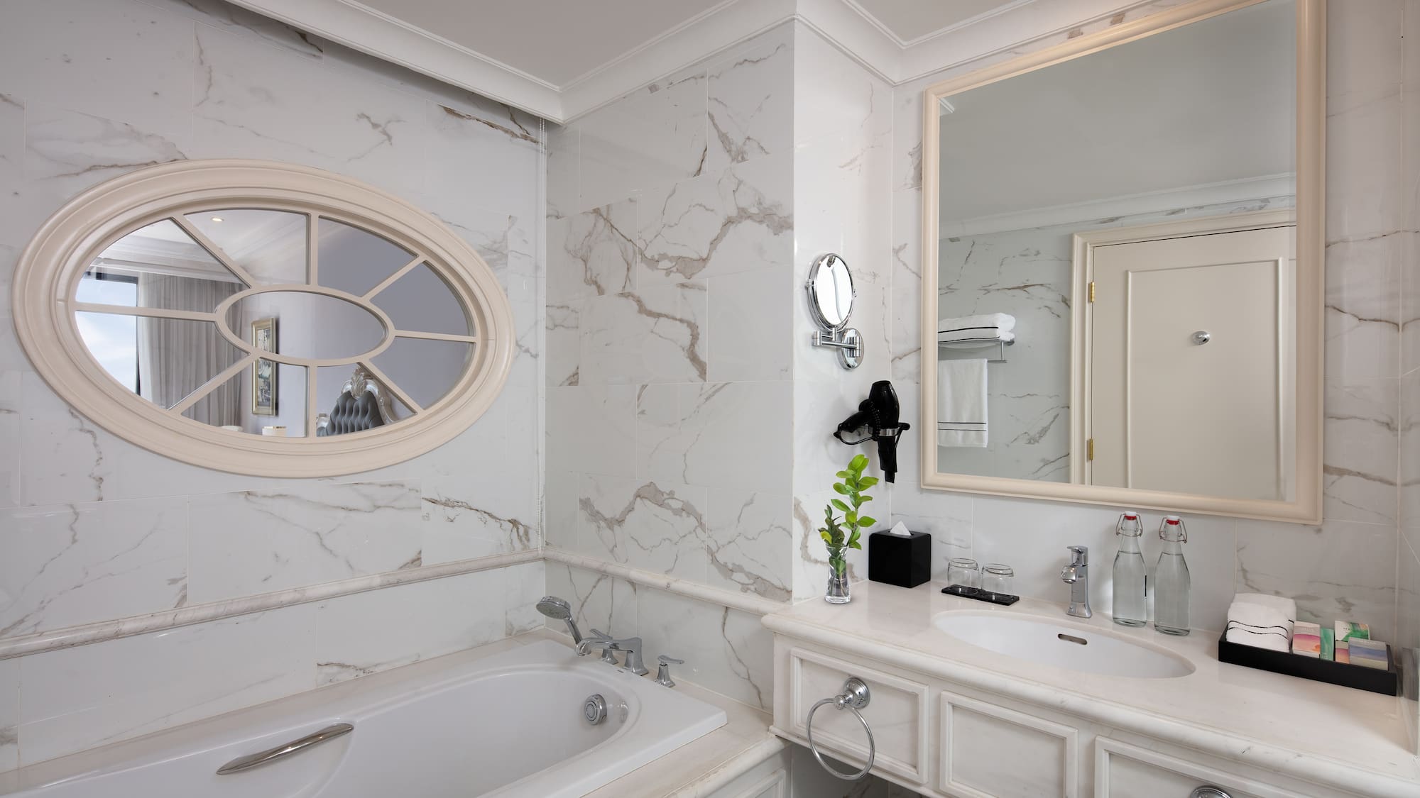 a bathroom with a tub and sink