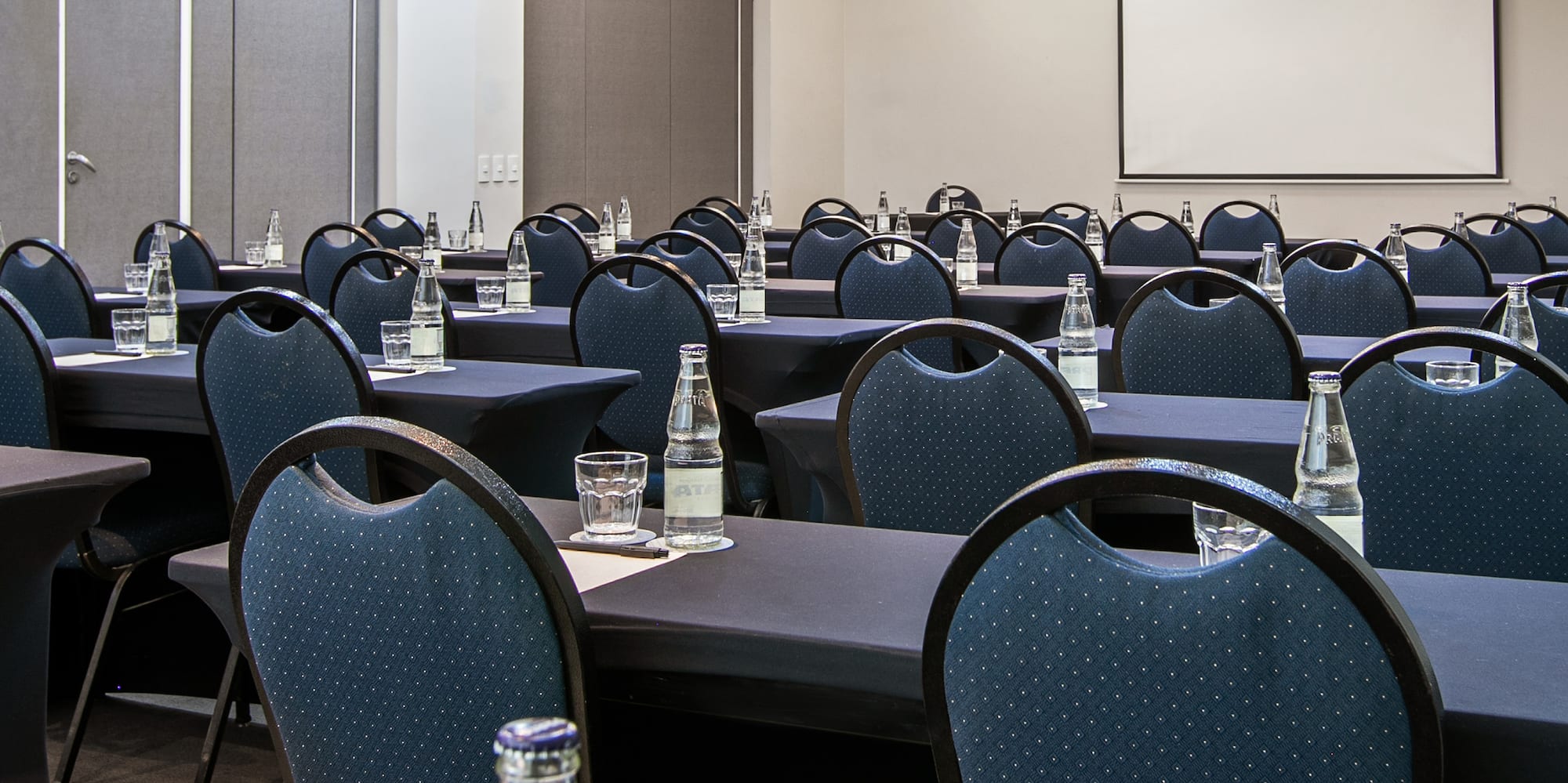a room with tables and chairs