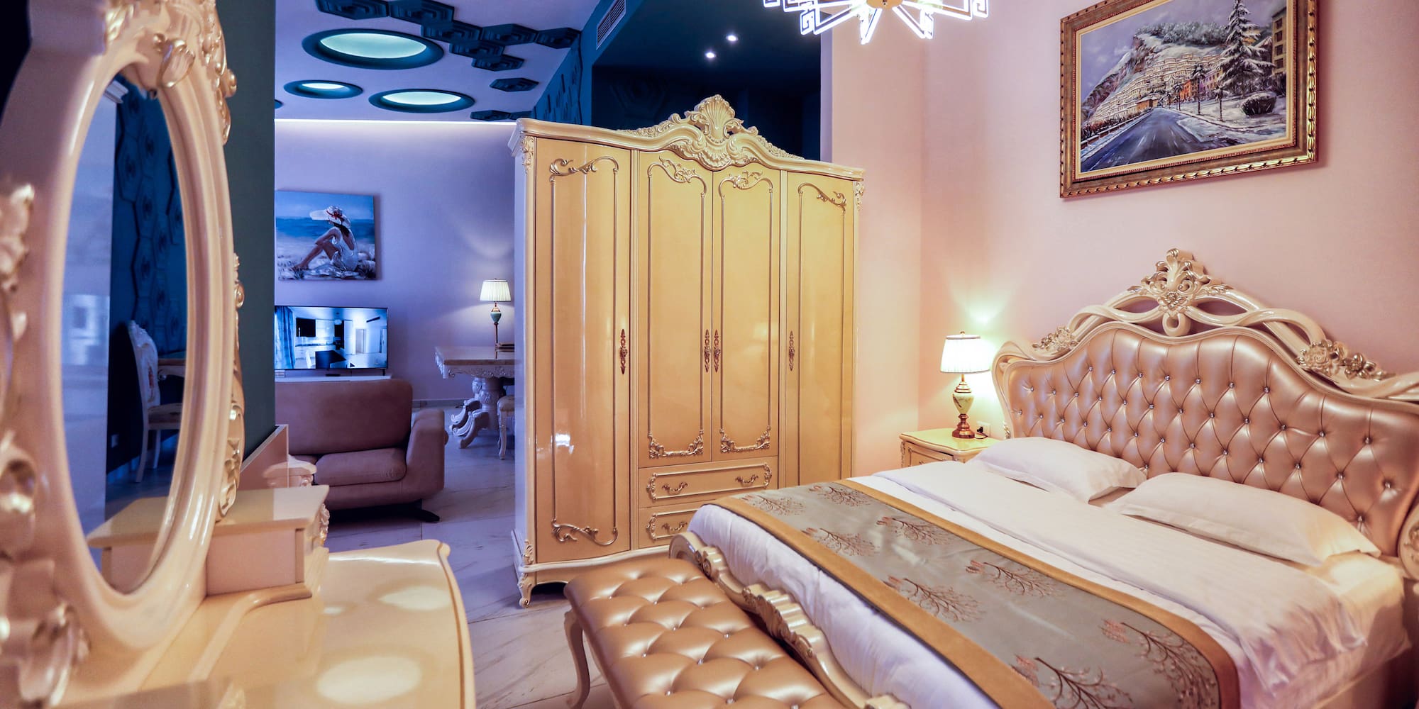 a bedroom with a bed and a wardrobe