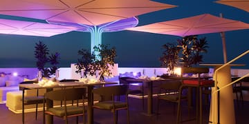 a restaurant with tables and chairs