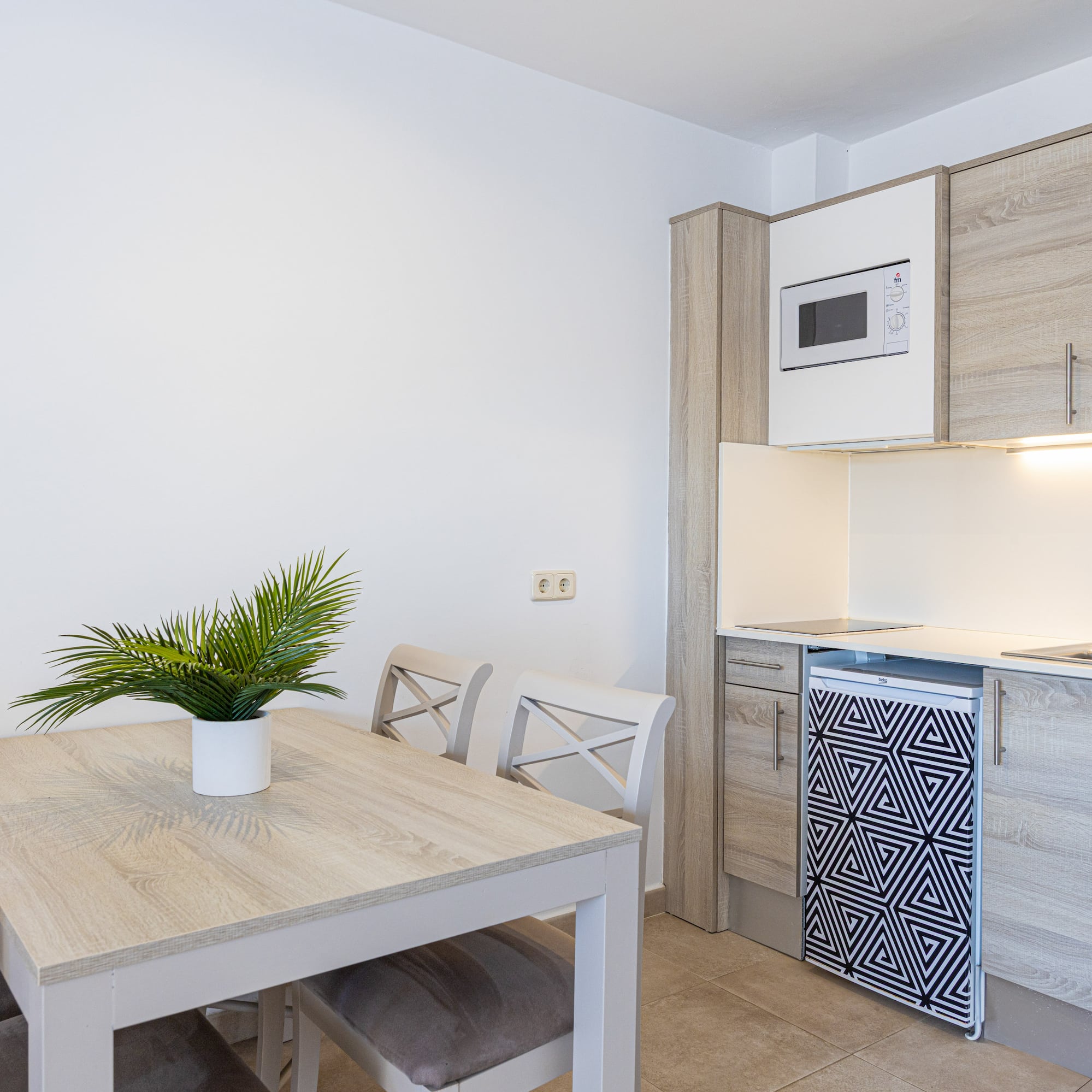 a table and chairs in a room