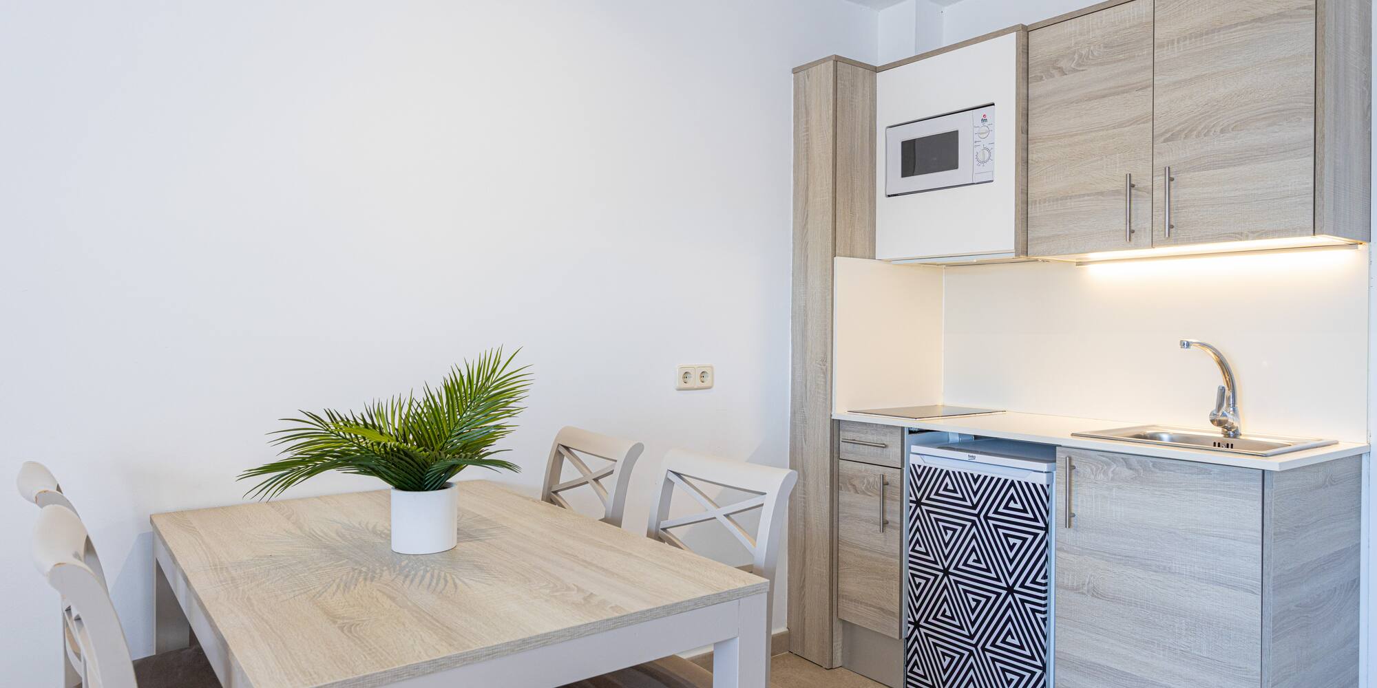 a table and chairs in a room