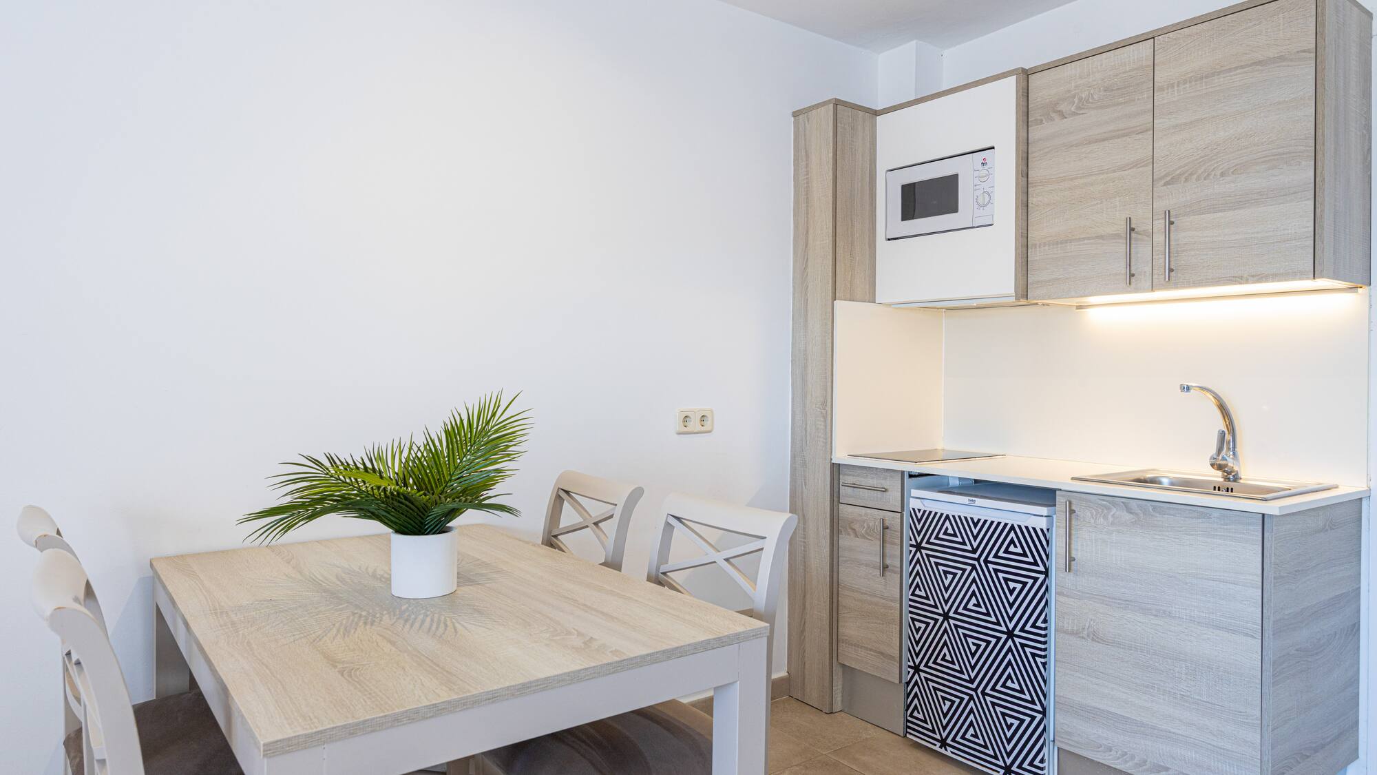 a table and chairs in a room