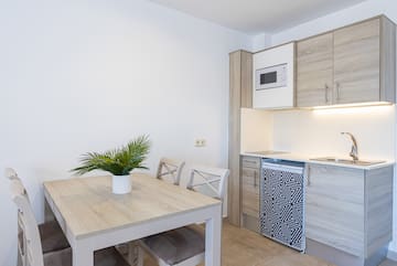 a table and chairs in a room