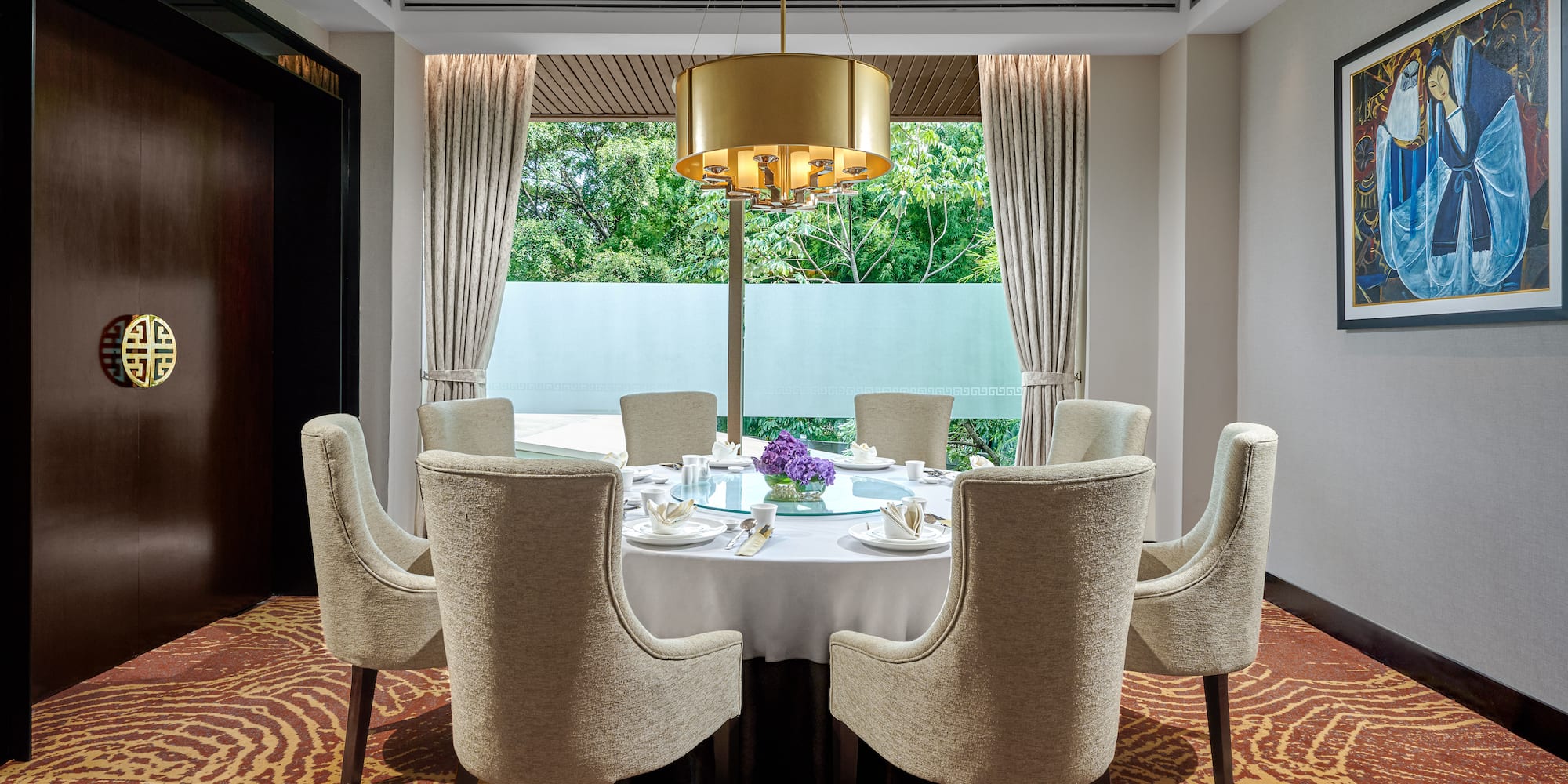 a room with a table and chairs