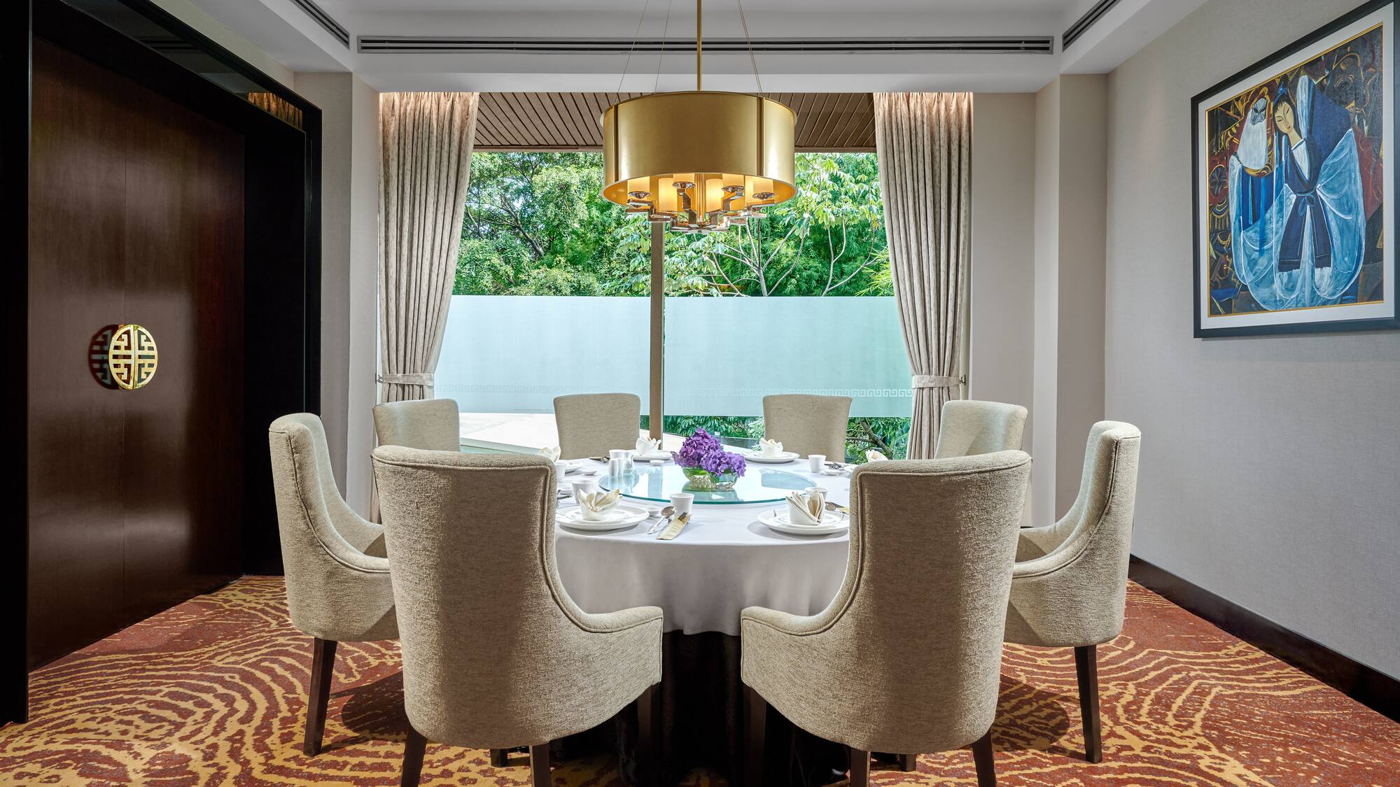 a room with a table and chairs