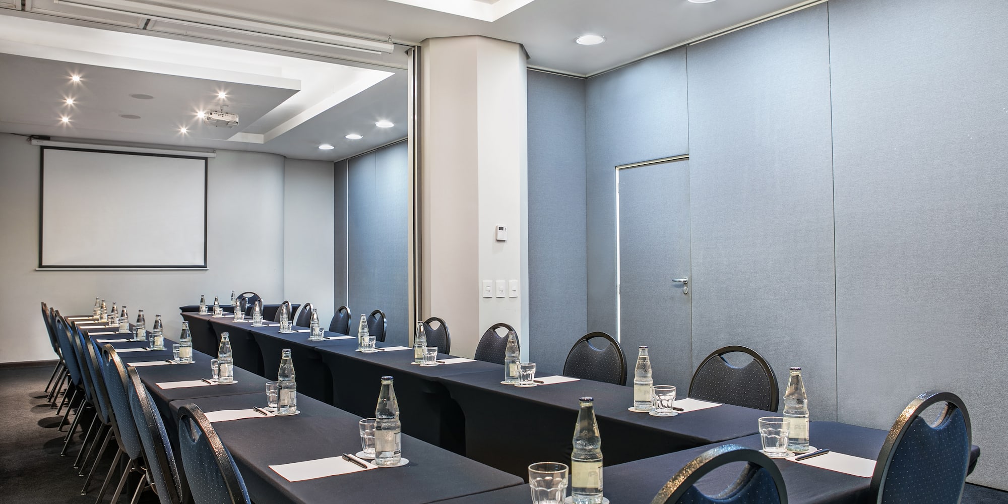 a room with tables and chairs