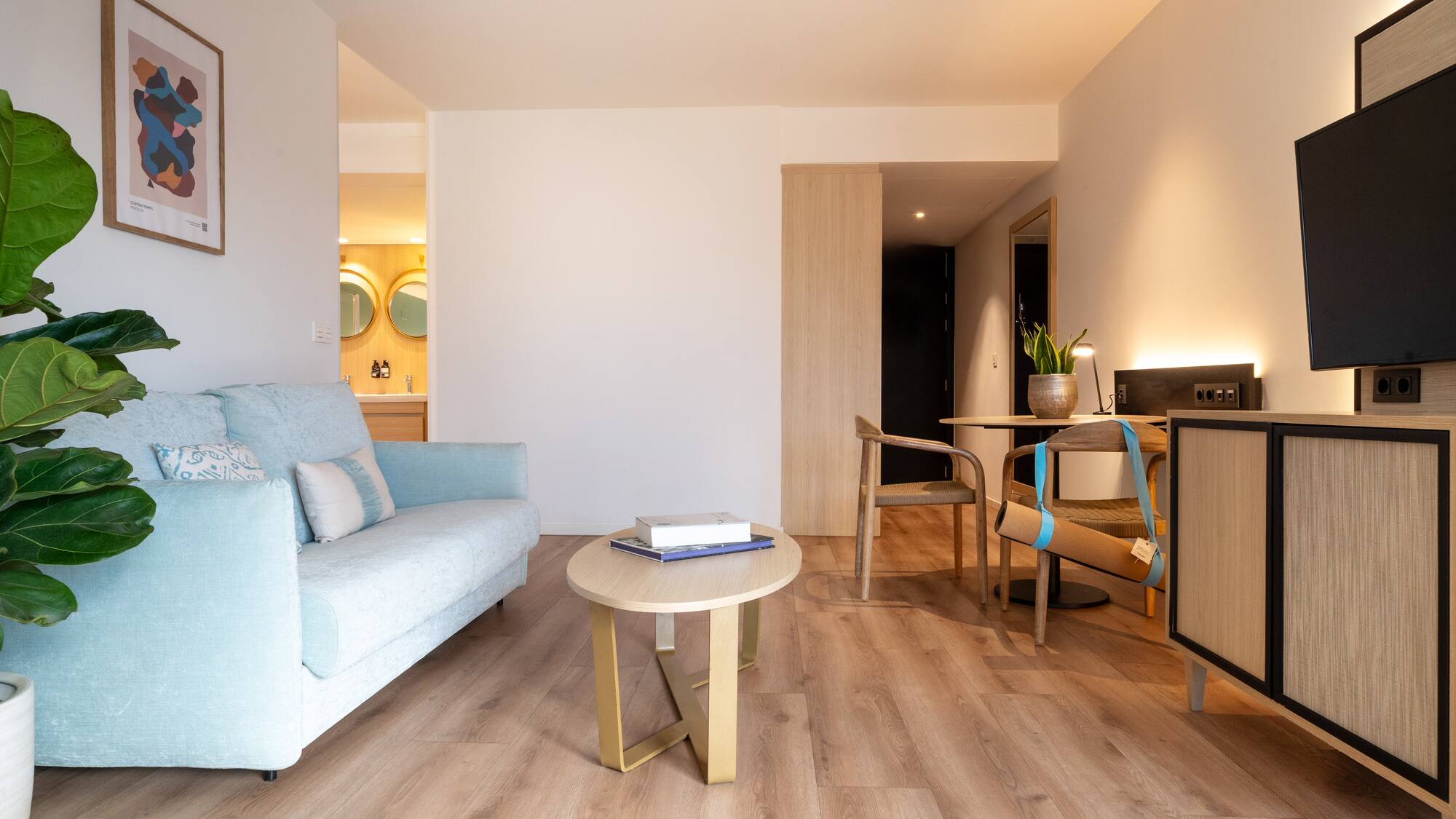 a living room with a couch and a table