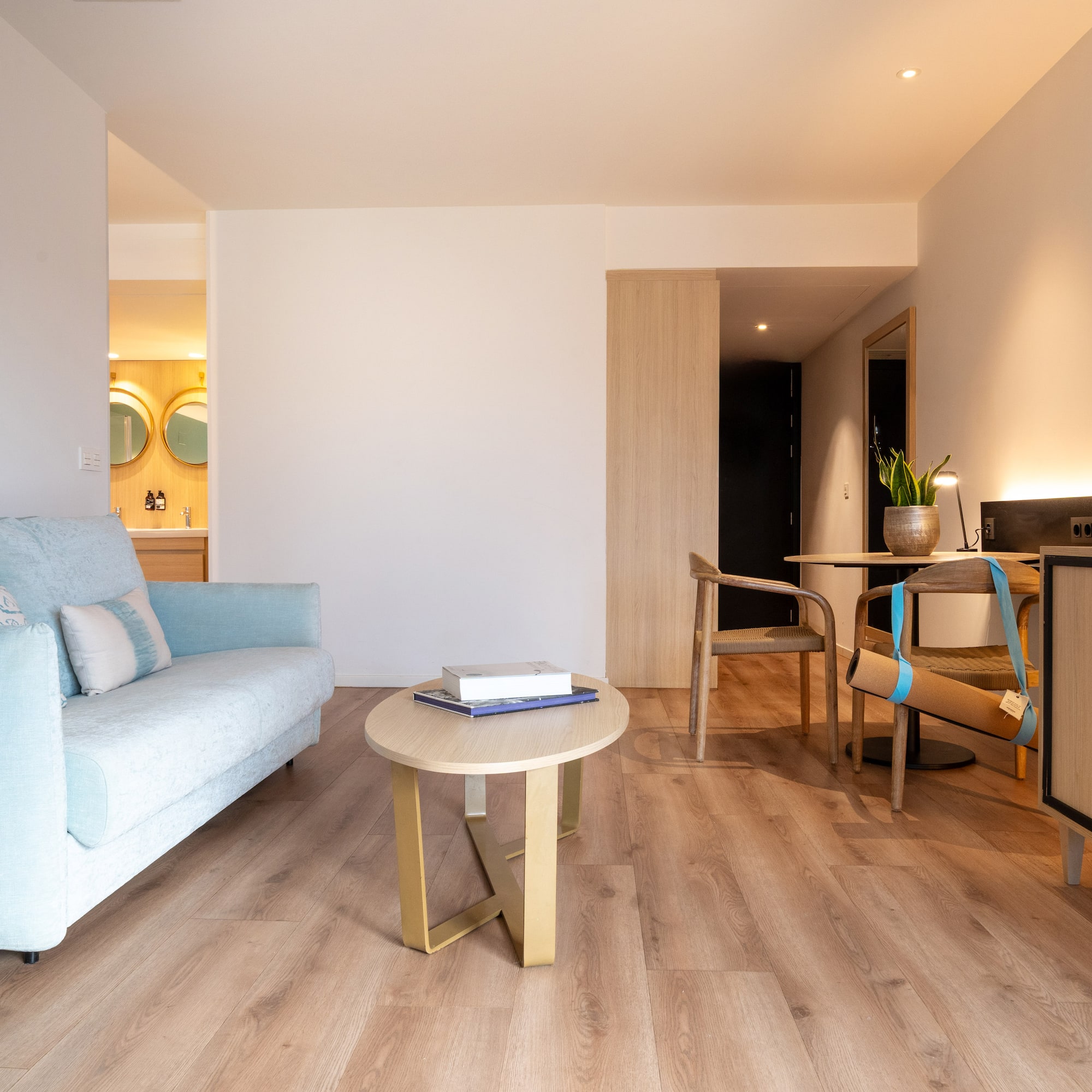 a living room with a couch and a table