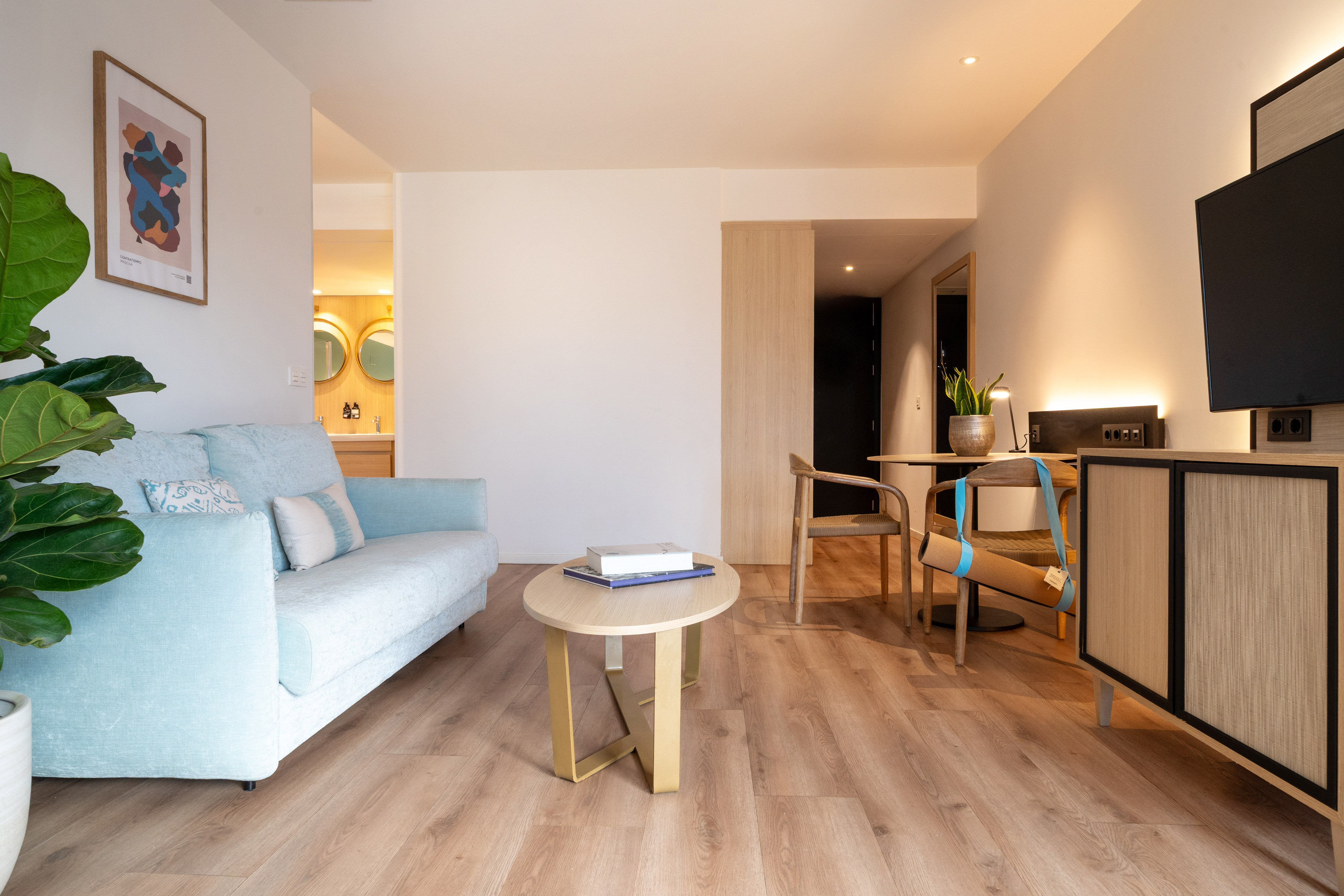 a living room with a couch and a table