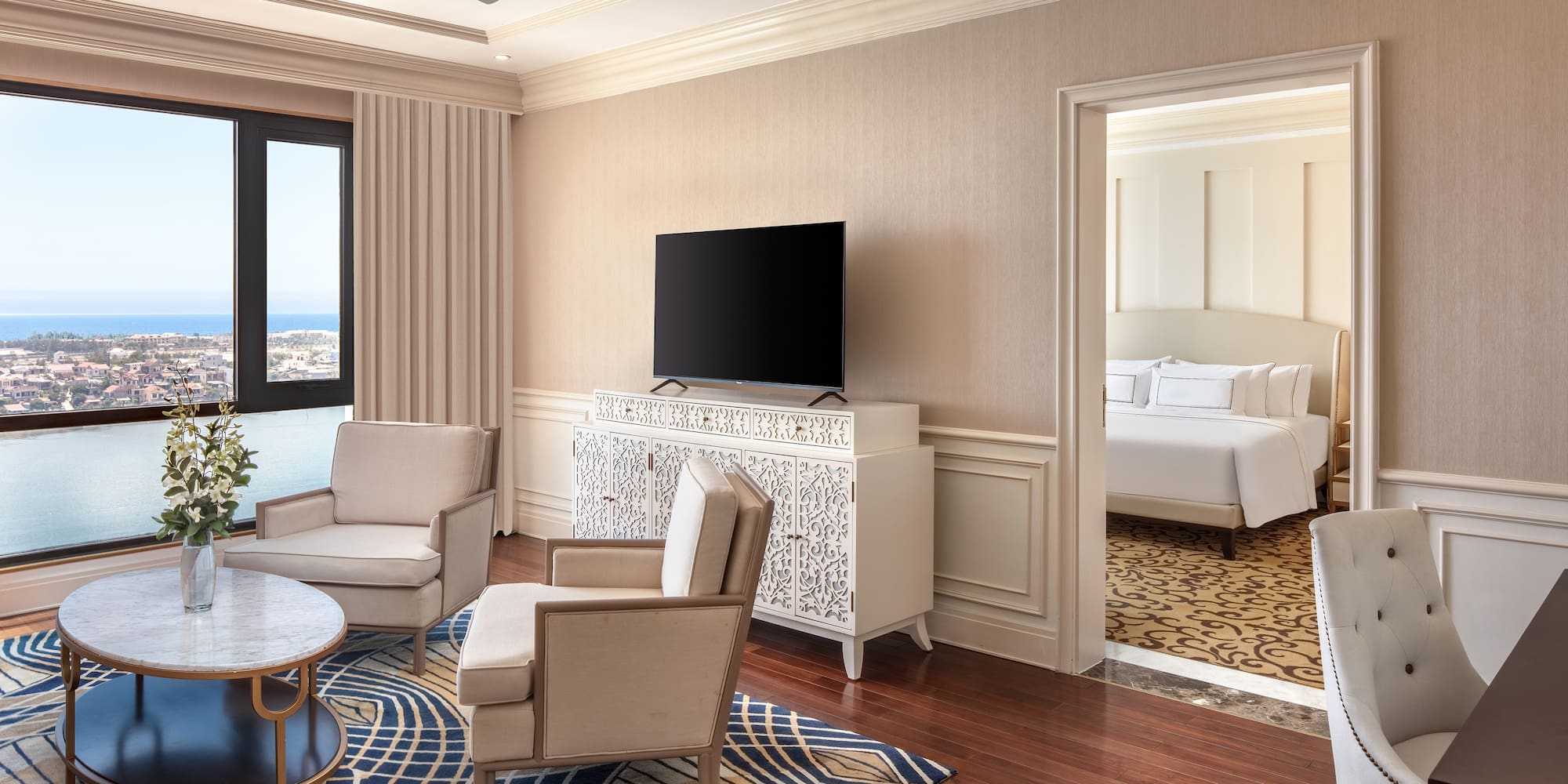 a room with a television and a bed