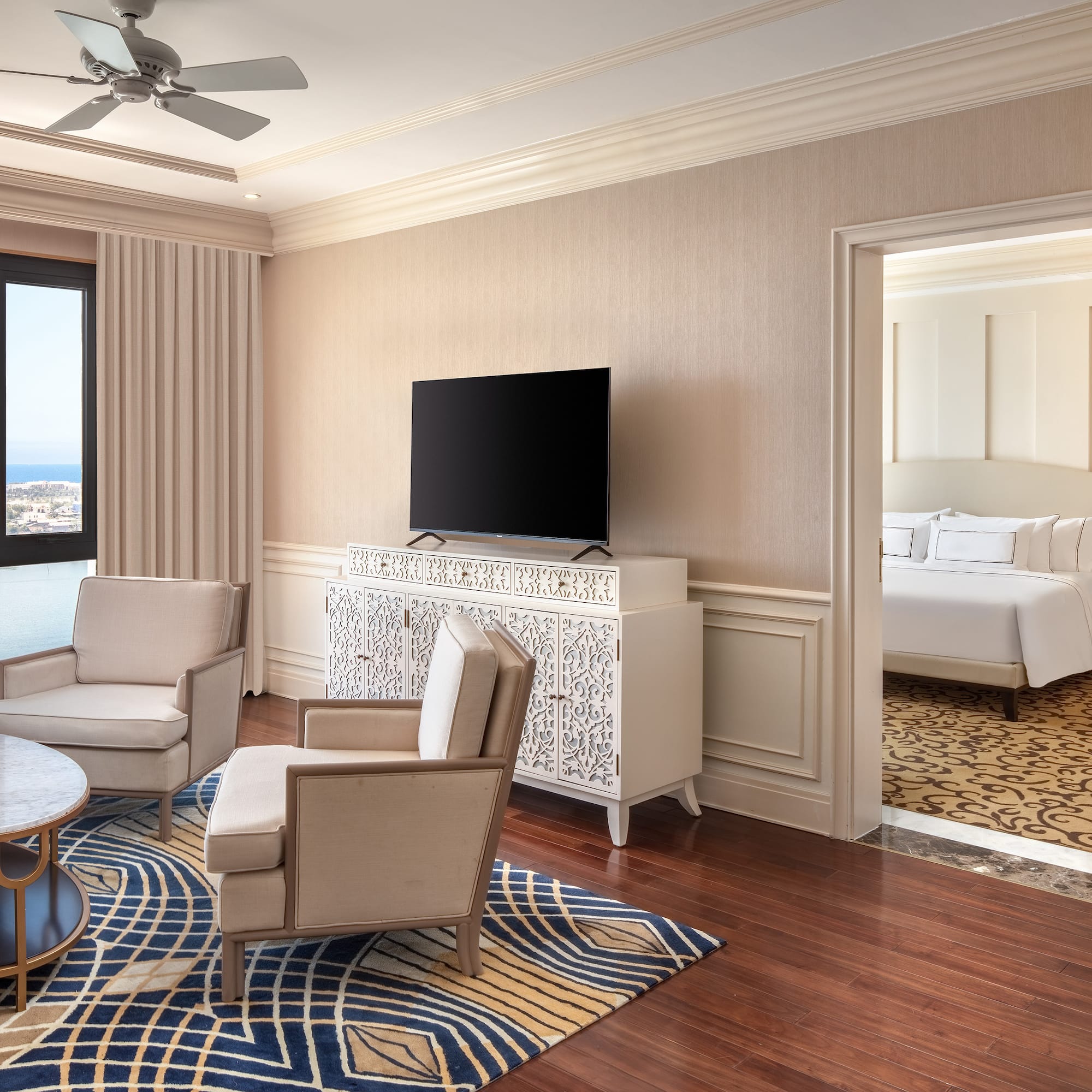 a room with a television and a bed