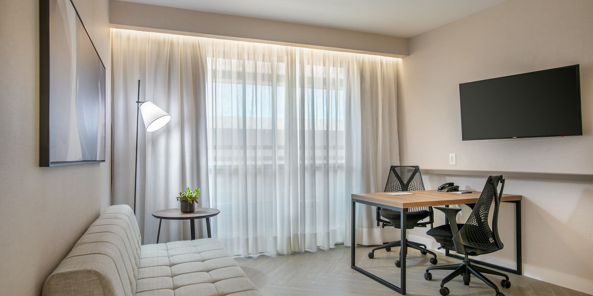 a room with a couch and a table