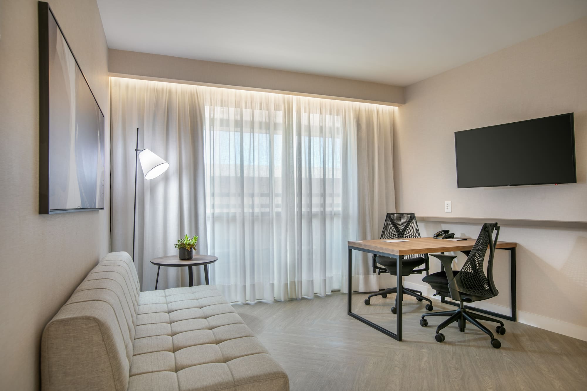 a room with a couch and a table