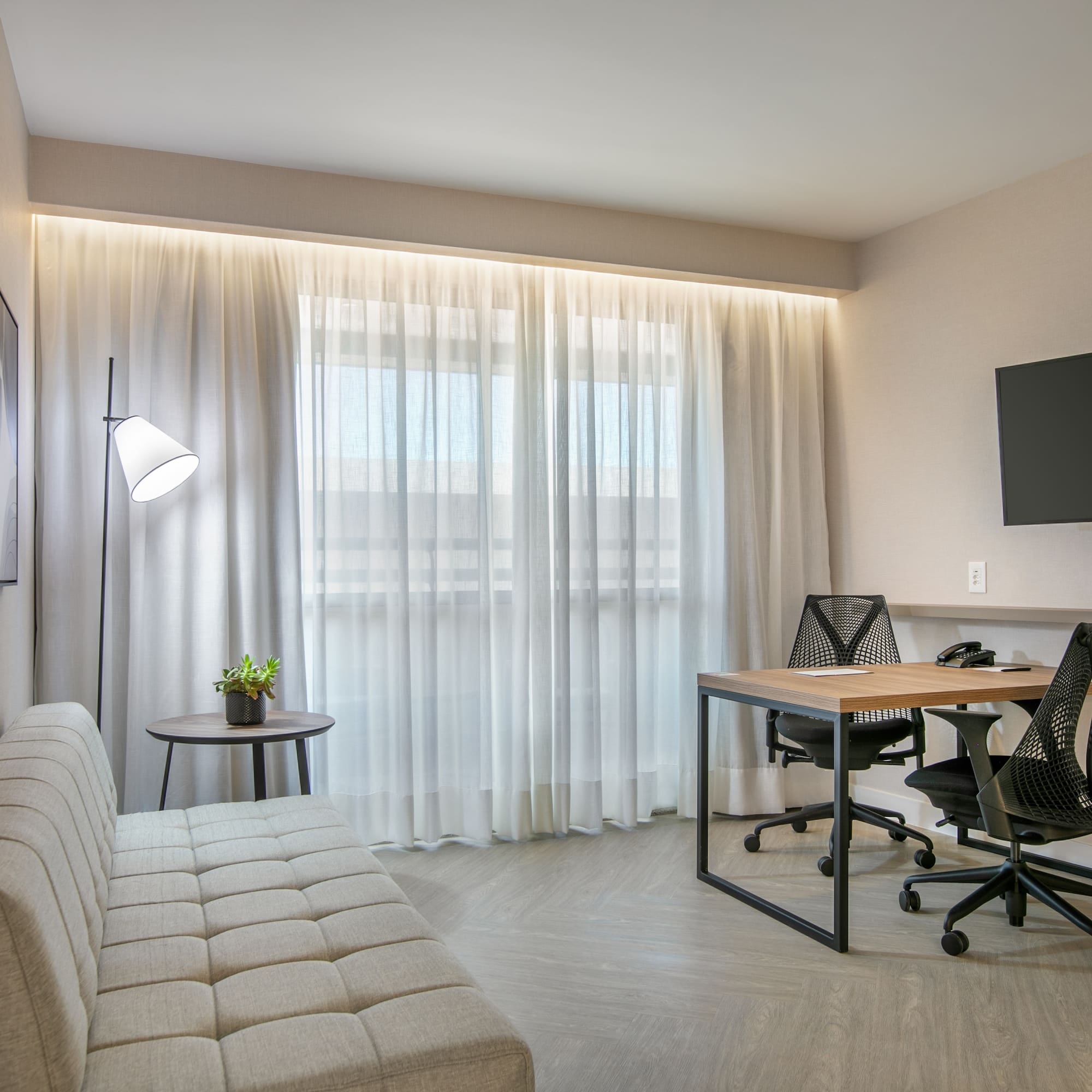 a room with a couch and a table