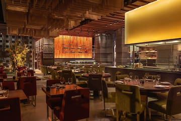 a restaurant with tables and chairs