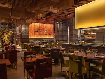 a restaurant with tables and chairs