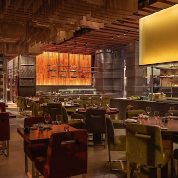 a restaurant with tables and chairs