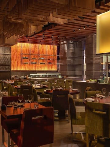 a restaurant with tables and chairs
