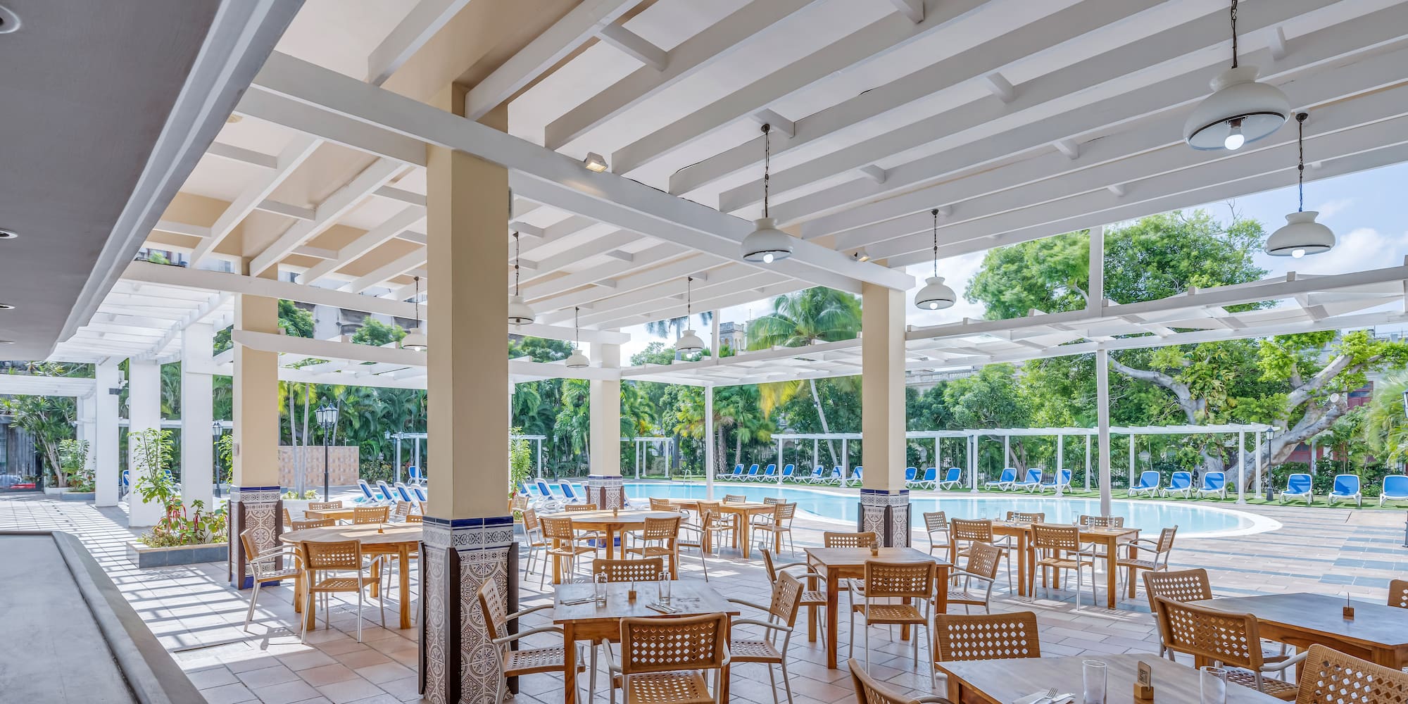 a room with tables and chairs