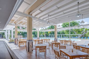 a room with tables and chairs