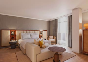 a bedroom with a bed and a table