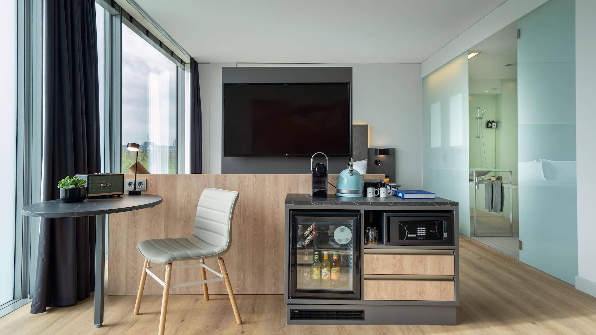 a room with a television and a table