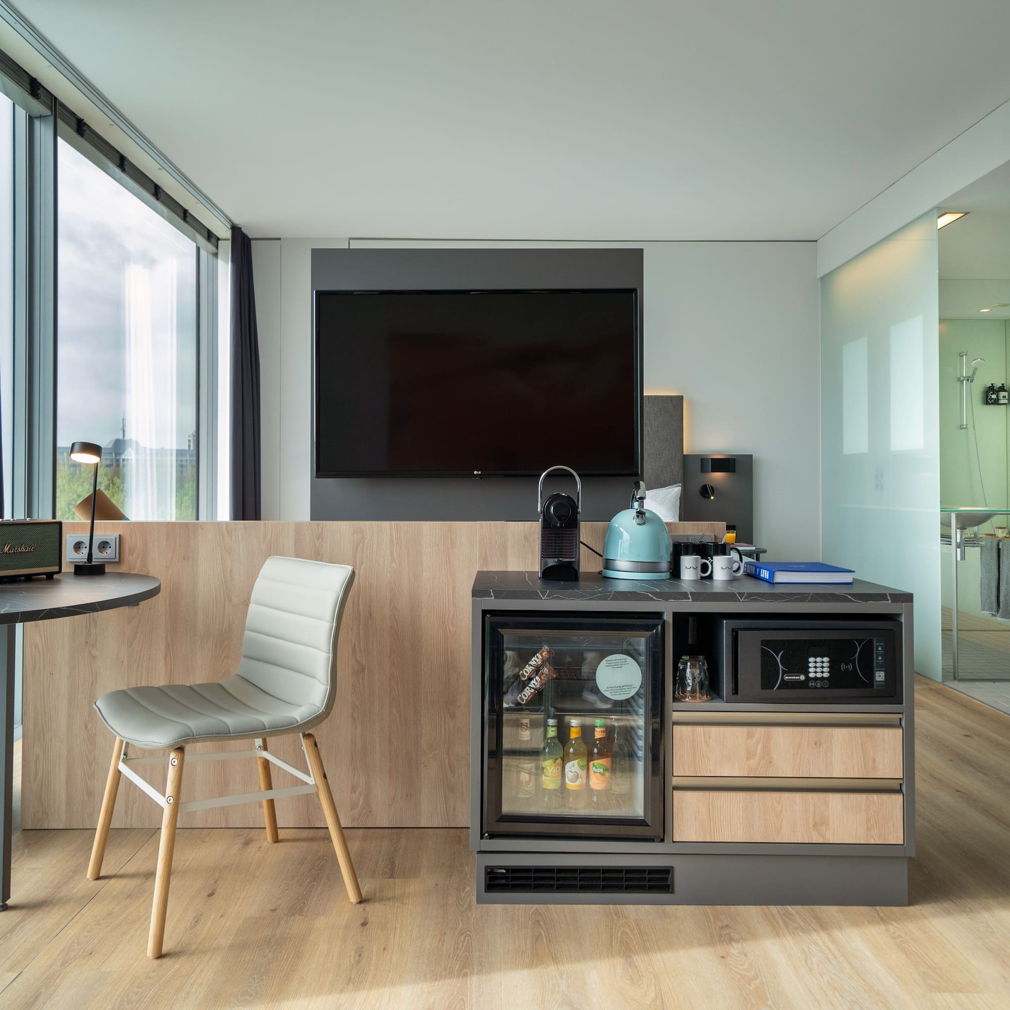 a room with a television and a table