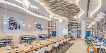 a room with tables and chairs