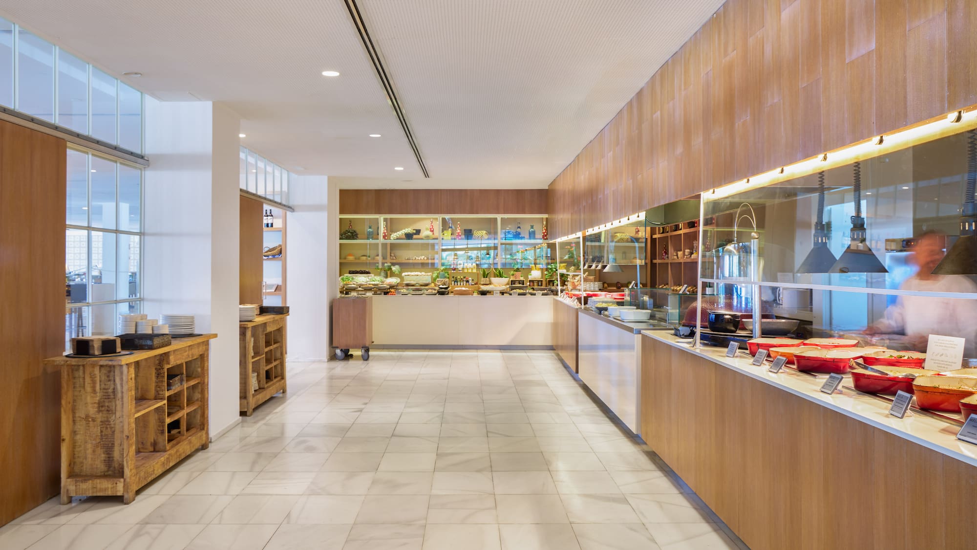a room with a buffet and shelves