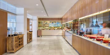 a room with a buffet and shelves