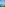 Turquoise beach, resort hotel, and coastal town from a cliff viewpoint.