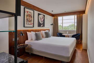 a room with a bed and a table