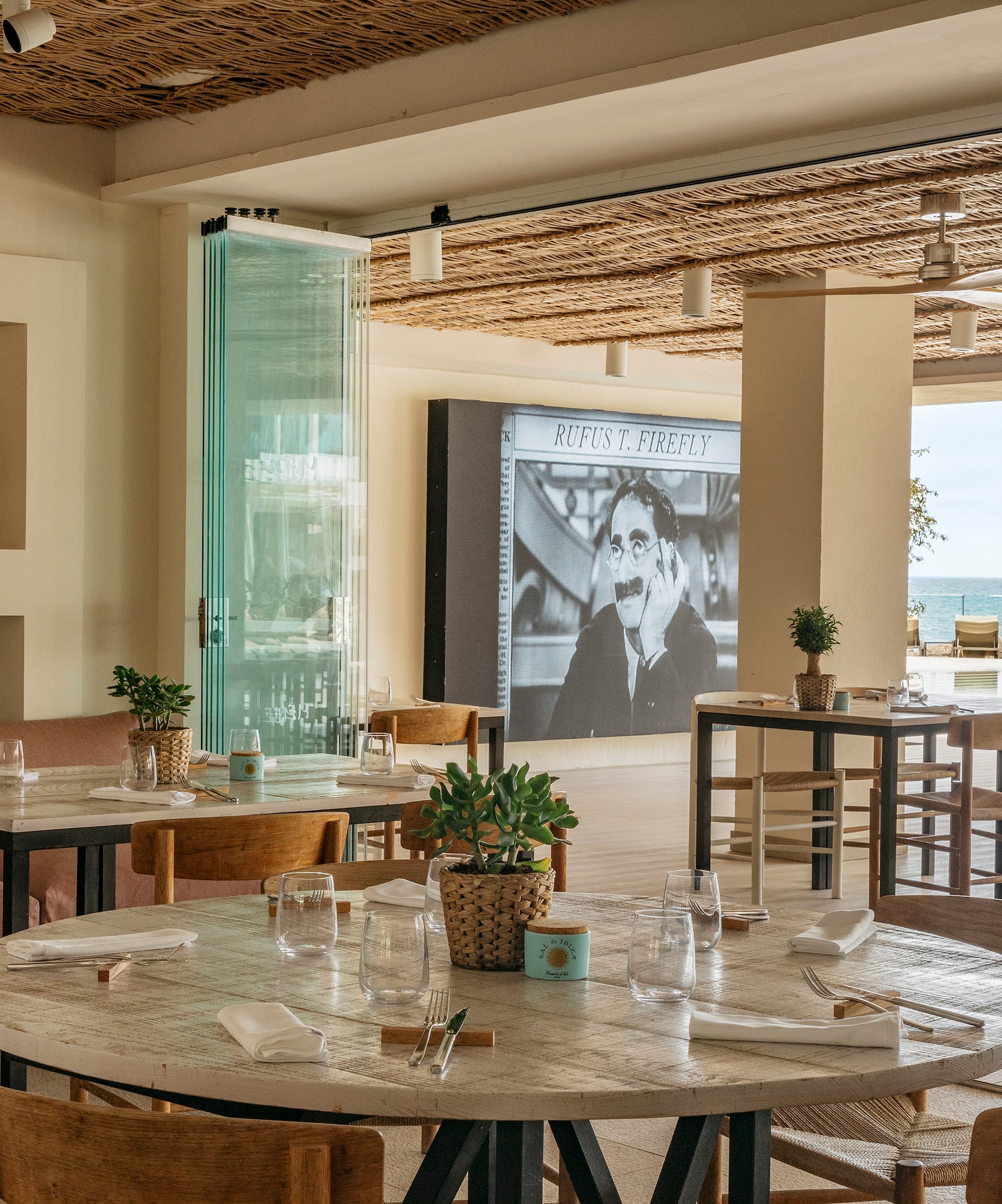 a restaurant with tables and chairs