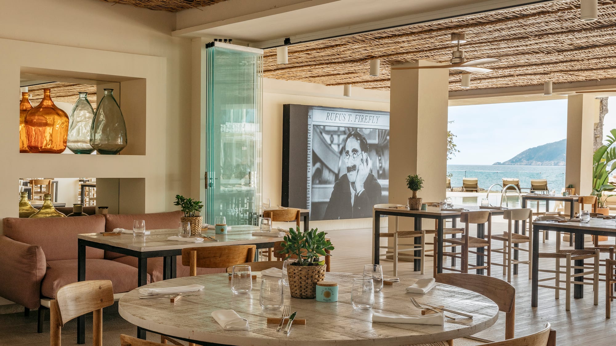 a restaurant with tables and chairs