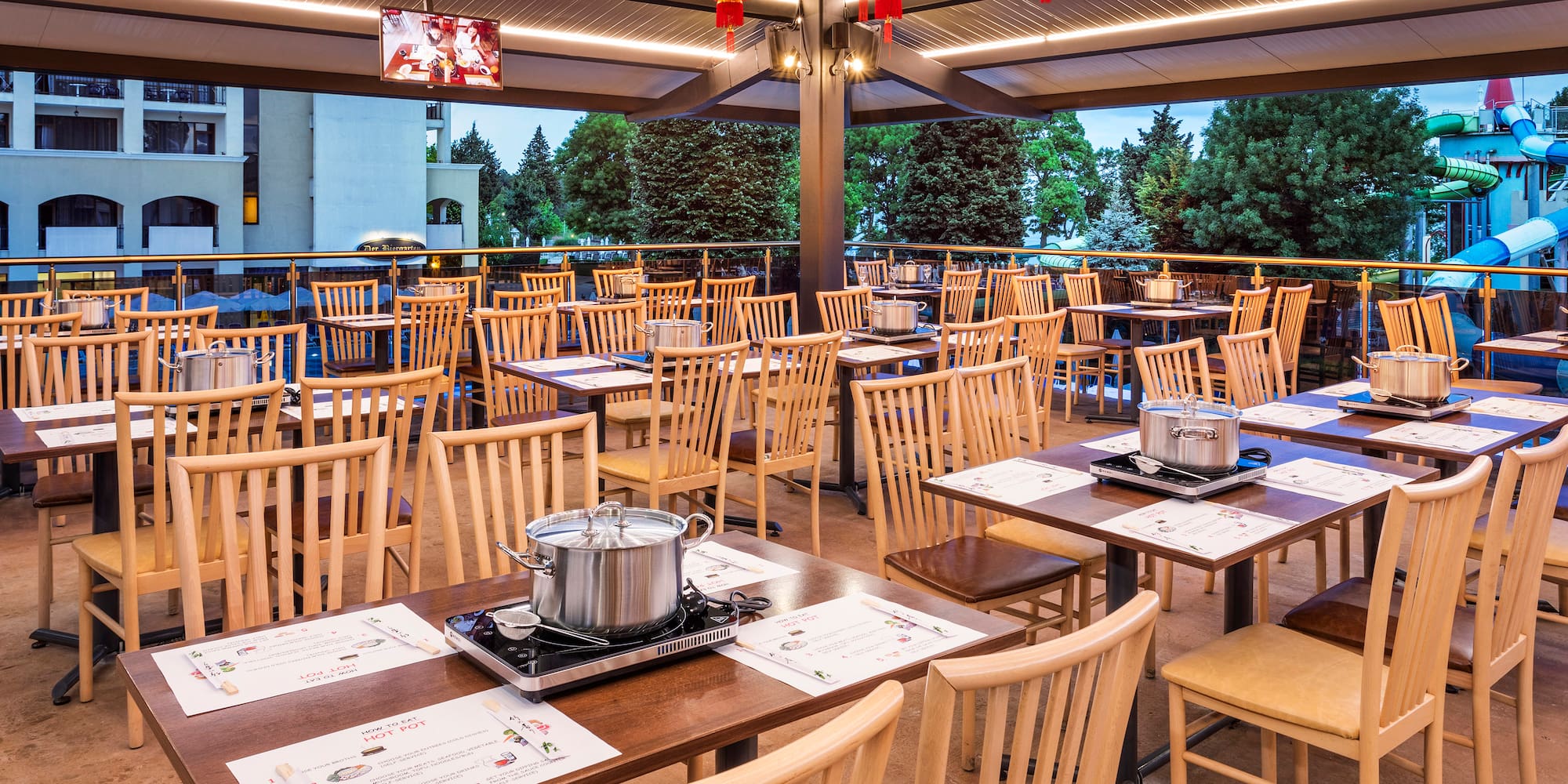 a restaurant with tables and chairs
